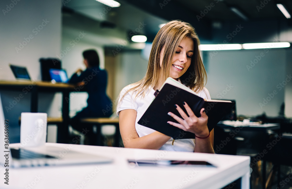 Aufkleber smiling hipster girl holding notepad checking items in to do list satisfied with completing tasks in