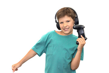 Boy plays a computer game with headphones and a joystick, game console.