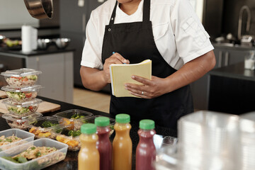 Cafe Owner Checking Order