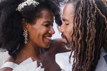 portrait of happy bride and groom
