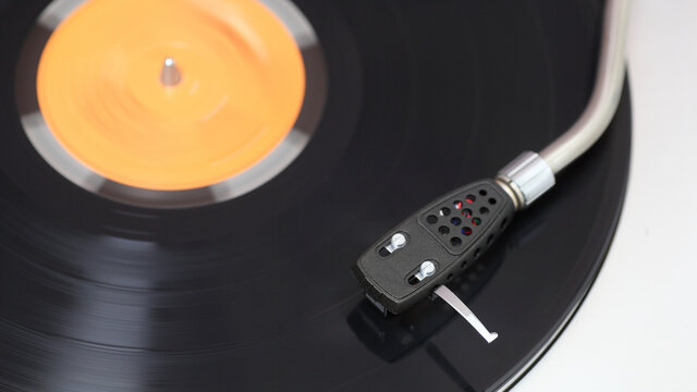 Vintage turntable with spinning record