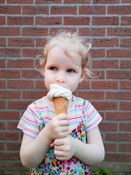 Toddler eats ice cream