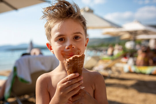 4 year old boy holding ice cream