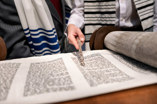 Synagogue: Anonymous Teen Using Pointer While Reading Torah