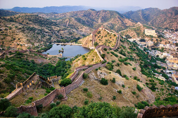 Landscape of Amer fort wall located on mountains in Jaipur city of Rajasthan state in India