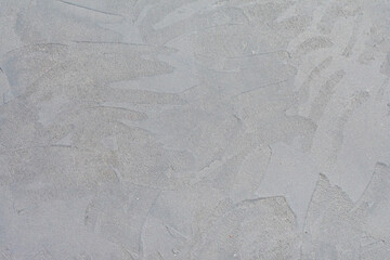 Grungy uneven gray background of natural cement textural.