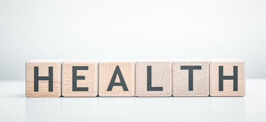Health word made with building wooden blocks.