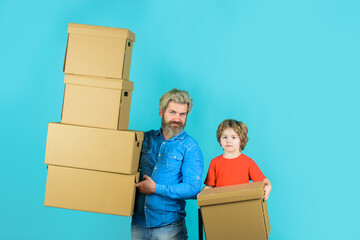 Delivery. Bearded man carry boxes. Happy son and father with cardboard box. Internet purchases and e-commerce concept. Delivery goods. Delivery, mail, shipment.