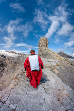 Guy in wingsuit before BASE jump