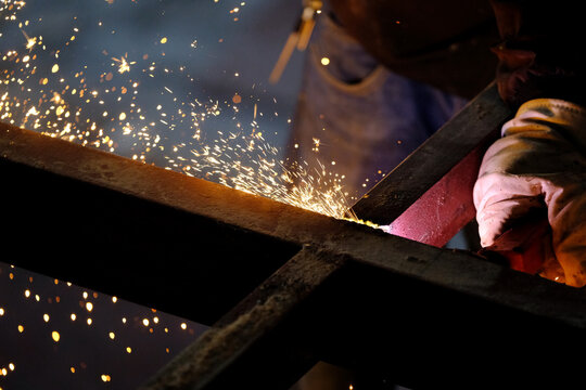 Close-up electric welding details at the construction site
