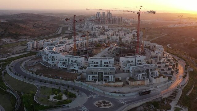 Construction Site and Cranes In modiin City,Israel,Aerial view, 
Drone view,July, Sunset,2020
