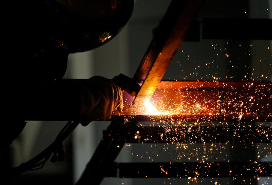 Close-up electric welding details at the construction site