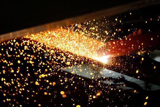 Close-up electric welding details at the construction site