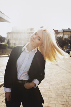 Attractive model posing outdoor during daylight time.