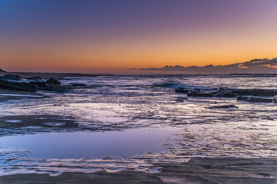 Sunrise Seascape with a low cloud bank