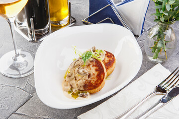 Fish cutlets in restaurant serving