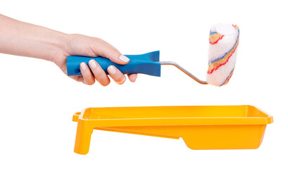 Hand with striped wool paint roller, home decoation and improvement. Isolated on white background.