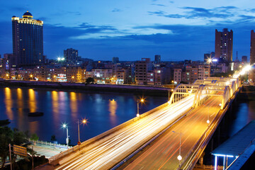 Fototapeta na wymiar The traffic bridge of the city at night.