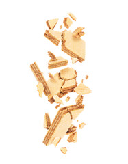 Broken waffles frozen in the air on a white background