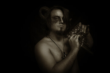 Faun with panflute