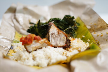 Fried Spicy tuna with Rice and vegetables (Nasi Bungkus Ikan Tuna)