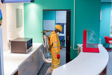 Pest control team spraying 