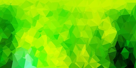 Fototapeta na wymiar Light green, yellow vector polygonal background.