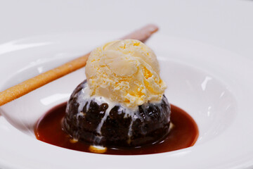 sticky toffee pudding with vanilla ice cream and caramel sauce.