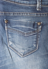 Fototapeta premium Texture of beige fashionable fabric, blue background