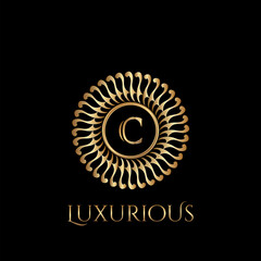 Circle luxury logo with letter C and symmetric swirl shape vector design logo