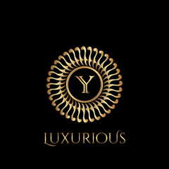 Circle luxury logo with letter Y and symmetric swirl shape vector design logo