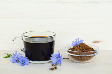 instant freeze dried granules from chicory root on wooden background copy space, place for text....