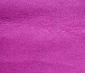 Pink abstract Background picture of fleece closeup texture fabric surface.