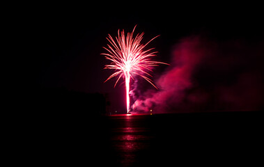 Fourth of July Fireworks Exploding Over the Lake