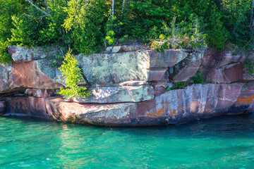 Naklejka premium Rocky Shores of the Apostle Islands National Lakeshore Near the Wisconsin Shoreline of Lake Superior