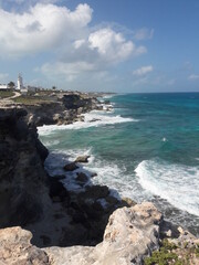 Isla Mujeres South Point Cancun Mexico rocky shore blue water and crashing waves 2020