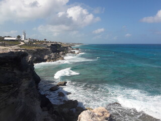 Isla Mujeres South Point Cancun Mexico rocky shore blue water and crashing waves 2020