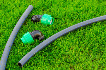 Plastic and hose for automatic watering the garden