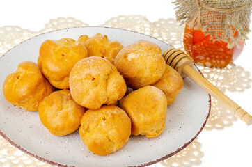 Sweet delicious crunchy homemade profiteroles. Studio Photo