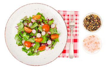Healthy nutrition. light salad of beetroot leaves, radish and cherry tomatoes
