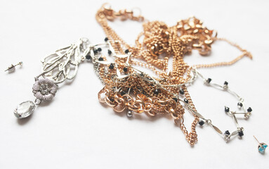 Tangled Necklaces on white background