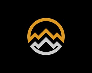 Gold and silver circle with abstract mountain