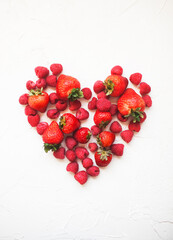 valentines day heart made of fresh raspberries and strawberries