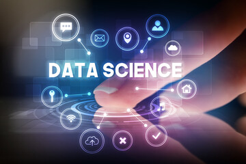 Finger touching tablet with web technology icons and DATA SCIENCE inscription, web technology concept