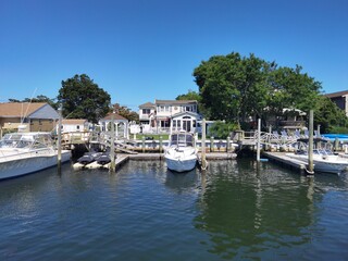 boats in the harbor, waterfront property with boat