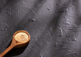 Organic maca powder in the spoon - Lepidium meyenii