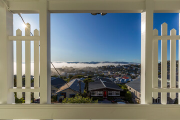 A view from the wooden terrace of a foggy day in Wellington, New Zealand