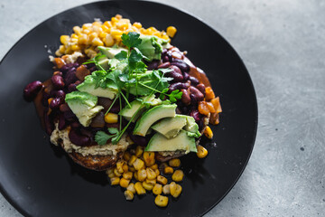 plant-based food, vegan mexican-inspired beans corn and avocado toast