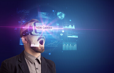 Businessman looking through Virtual Reality glasses with NEW CAREER inscription, new business concept