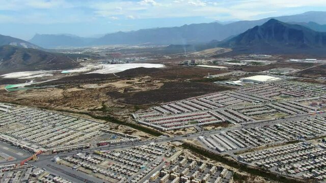 Business and industrial center in Monterrey fringed by high mountains and La Huasteca park
